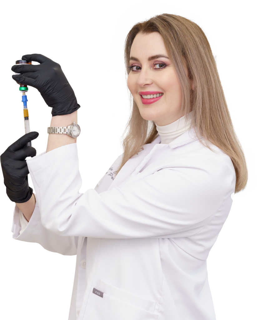 Hula Castellon, Founder, FNP, MSN holding a vial of PRP for hair restoration.